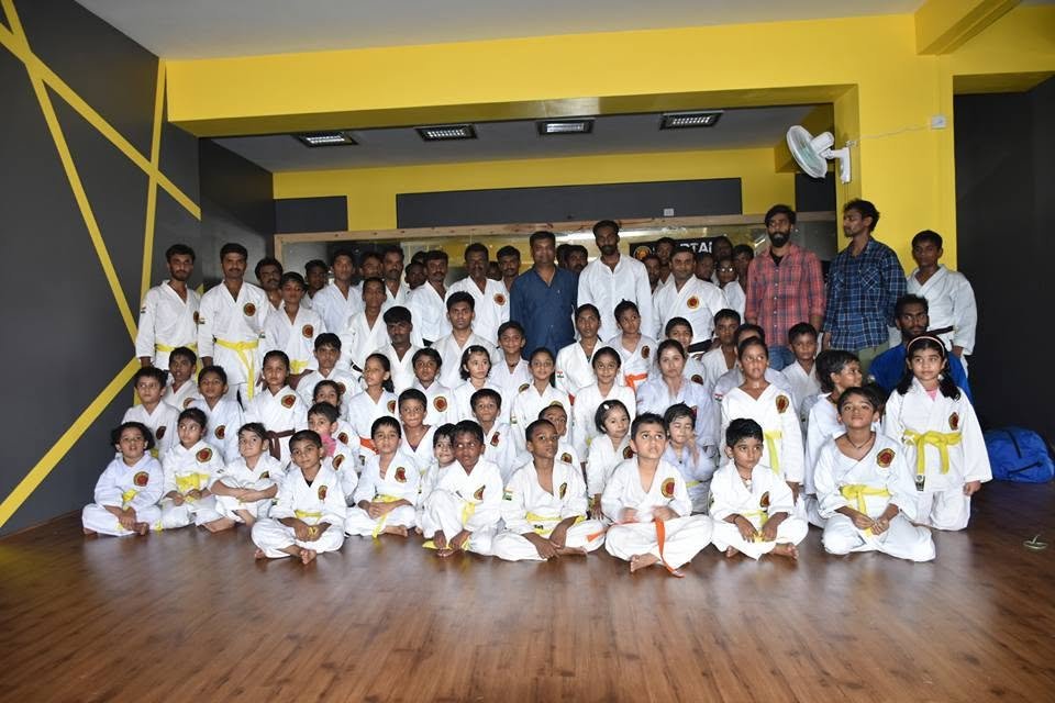 Spartan Martial Arts Academy students and instructors together at the dojo